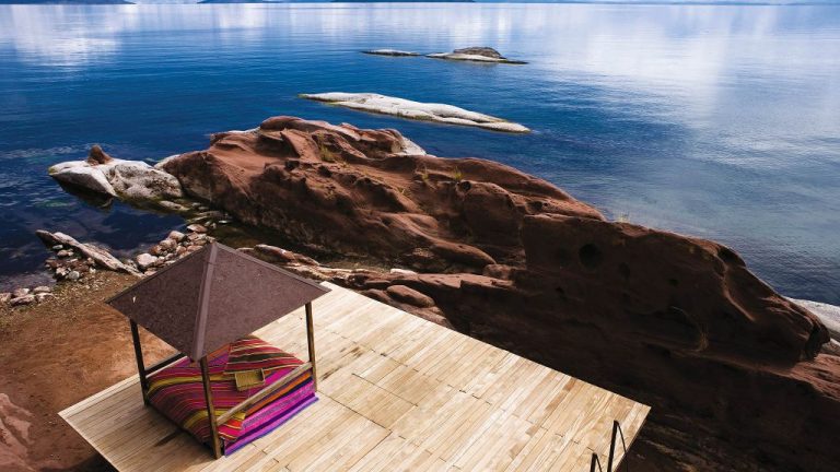 lake with dock and cabana with peruvian fabric