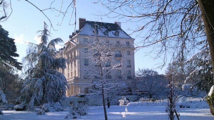 hotel surrounded by snow in winter