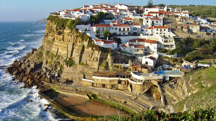 cliffside buildings on the coastline