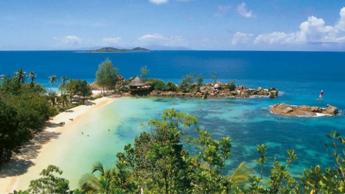 cove with white sandy beach and turquoise water