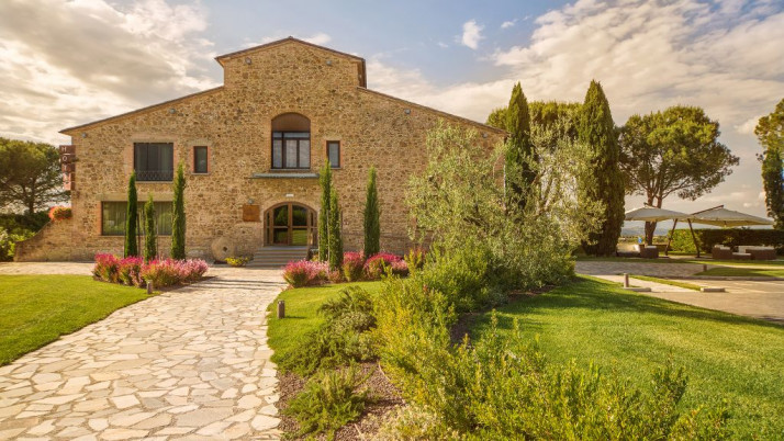 stone building and manicured gardens