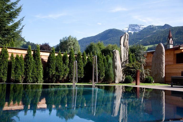 Das Posthotel pool and trees