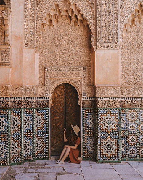 Intricate Moroccan doors at Ben Youssef Madrasa