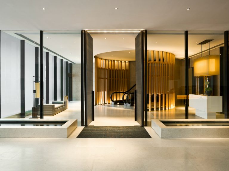 Hotel lobby with glass partitions