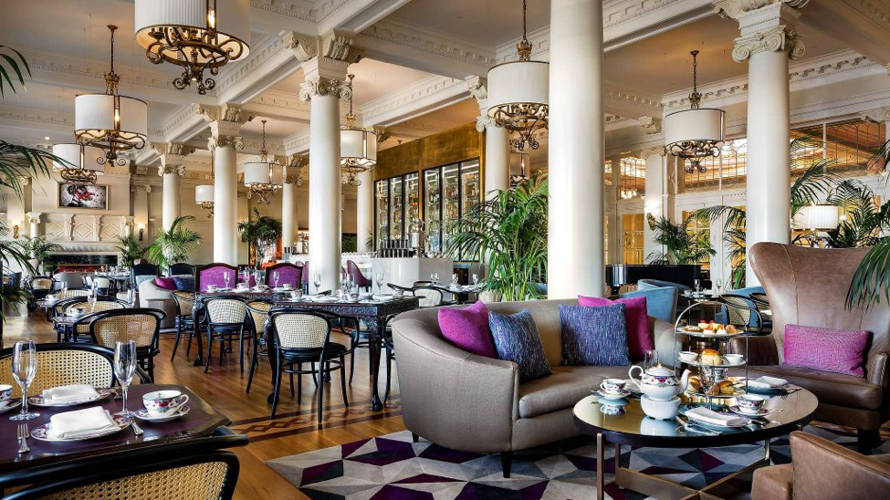 Fairmont Empress tea lounge with tables and sofas