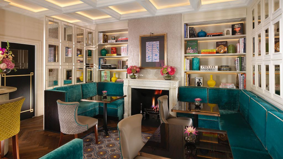 Flemings Mayfair lounge with colorful books and banquettes