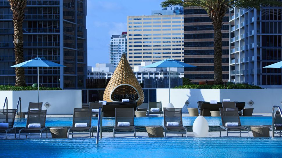 Kimpton EPIC Hotel pool deck with high rise buildings in background