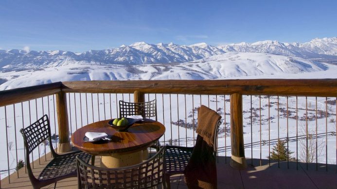 Amangani terrace overlooking snow landscape