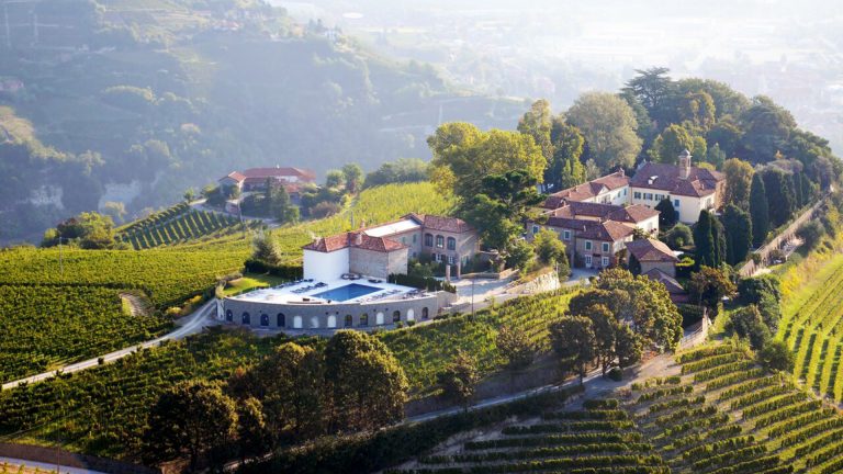 Relais San Maurizio hotel aerial view with green hills and valleys