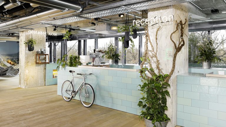 25hours Hotel Bikini Berlin lobby check-in with bicycle