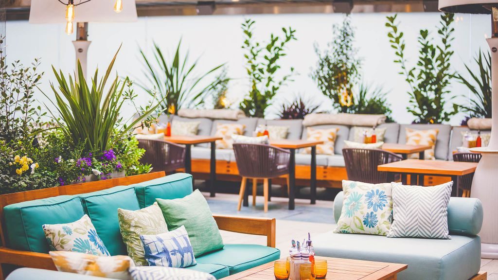 Rosewood Hotel Georgia rooftop Reflections bar with summer theme