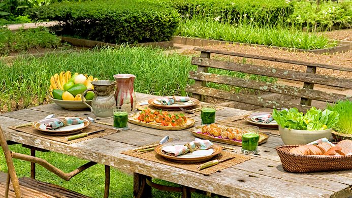 The Farm at San Benito outdoor lunch on wooden bench table