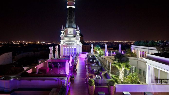 ME Madrid Reina Victoria: roof terrace at night with purple lighting