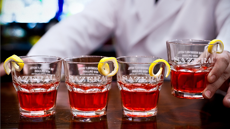 Sazerac cocktails in Sazerac branded glasses