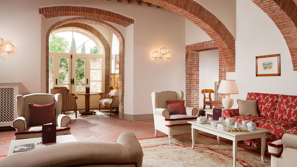 Hotel Borgo San Felice lobby with bricked arches