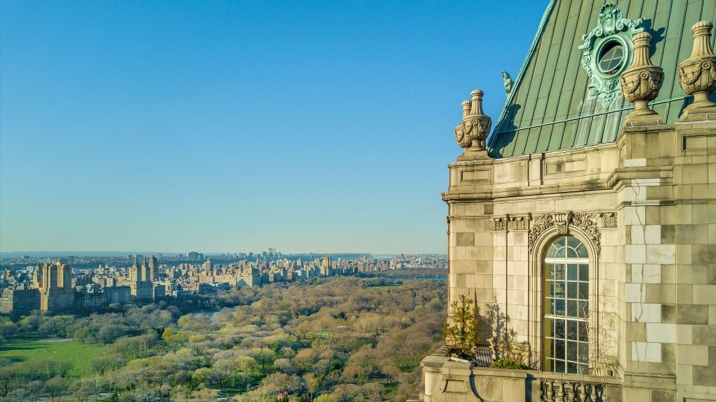 Exterior of The Pierre, A Taj Hotel, New York towering over Central Park