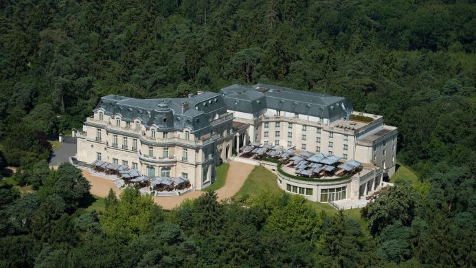 Tiara Château Hotel Mont Royal Chantilly exterior surrounded by forest
