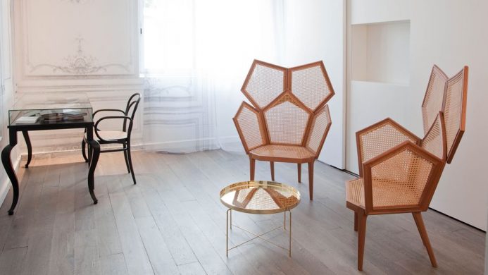 Geometric design chairs in minimal room at La Maison Champs Élysées