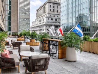 Terrace Bar at the Fairmont The Queen Elizabeth with Montreal buildings in the background