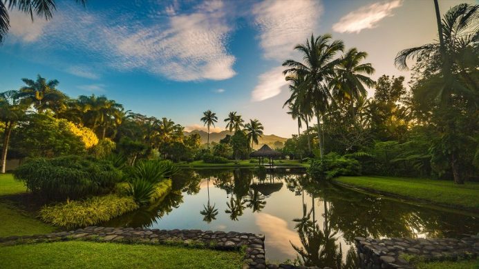 Lagoon surrounded by green landscape at The Farm at San Benito