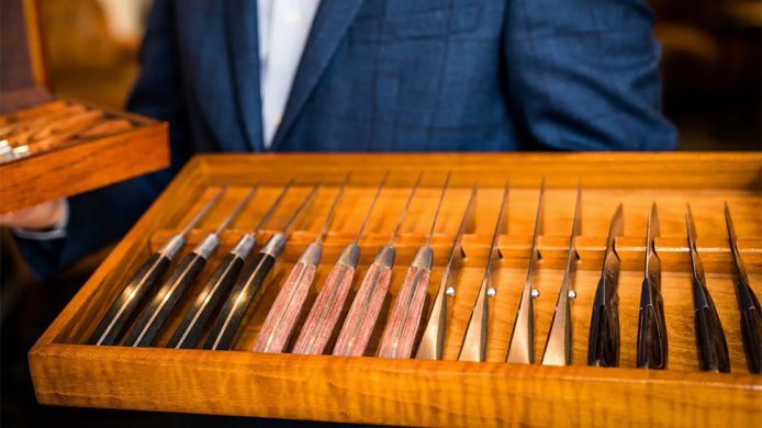 Various steak knives in a wooden box at Park Hyatt Aviara Resort