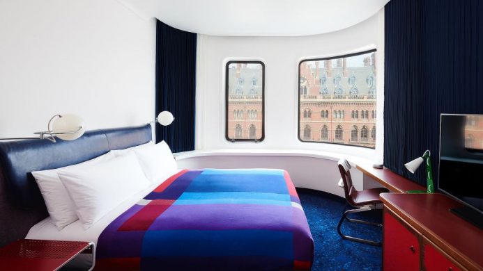 The Standard London's King Room with color-blocked blanket on bed