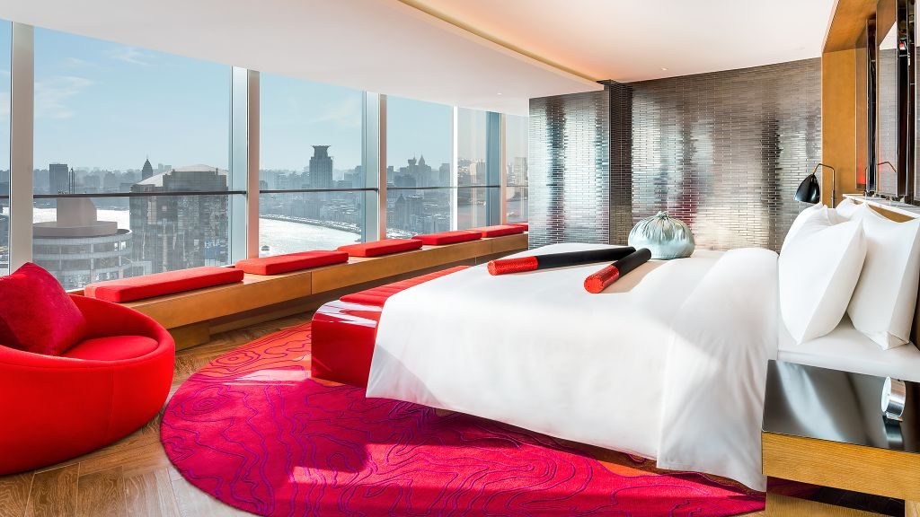 W Shanghai - The Bund's Fantastic Suite with dumpling and chopsticks pillows on bed