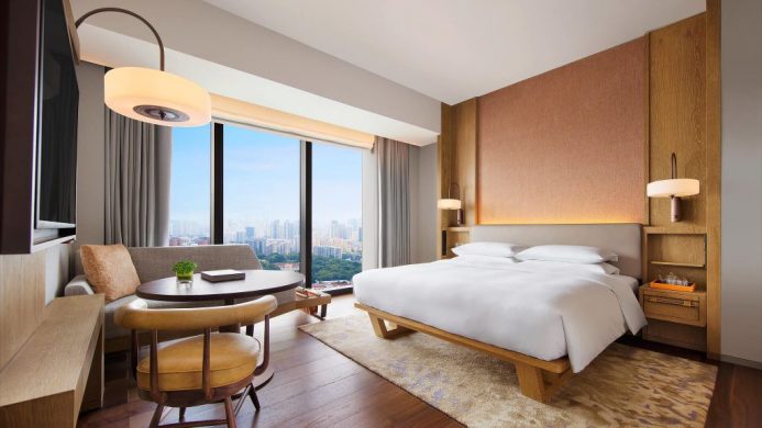 Andaz Singapore's king bedroom with city view