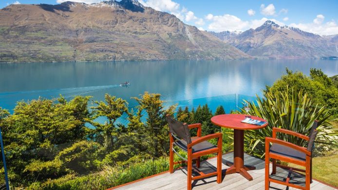 Private villa deck at Azur hotel, overlooking a remote bay and mountains