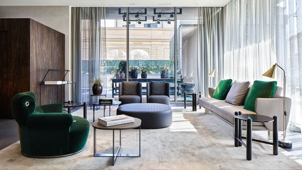Hotel Viu Milan's lobby filled with bespoke furniture and flooded with natural light