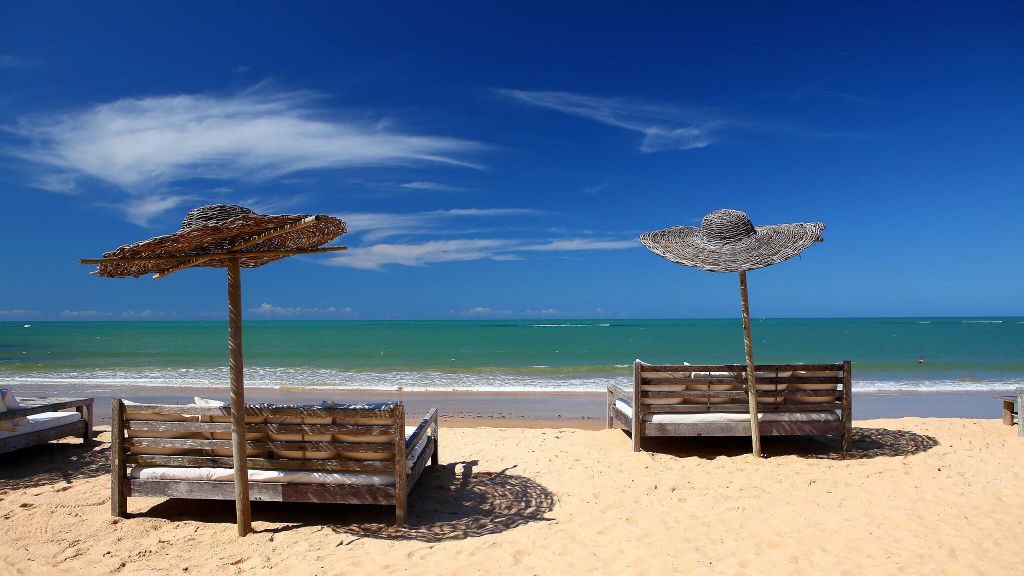 UXUA Casa Hotel & Spa's sofas on the beach