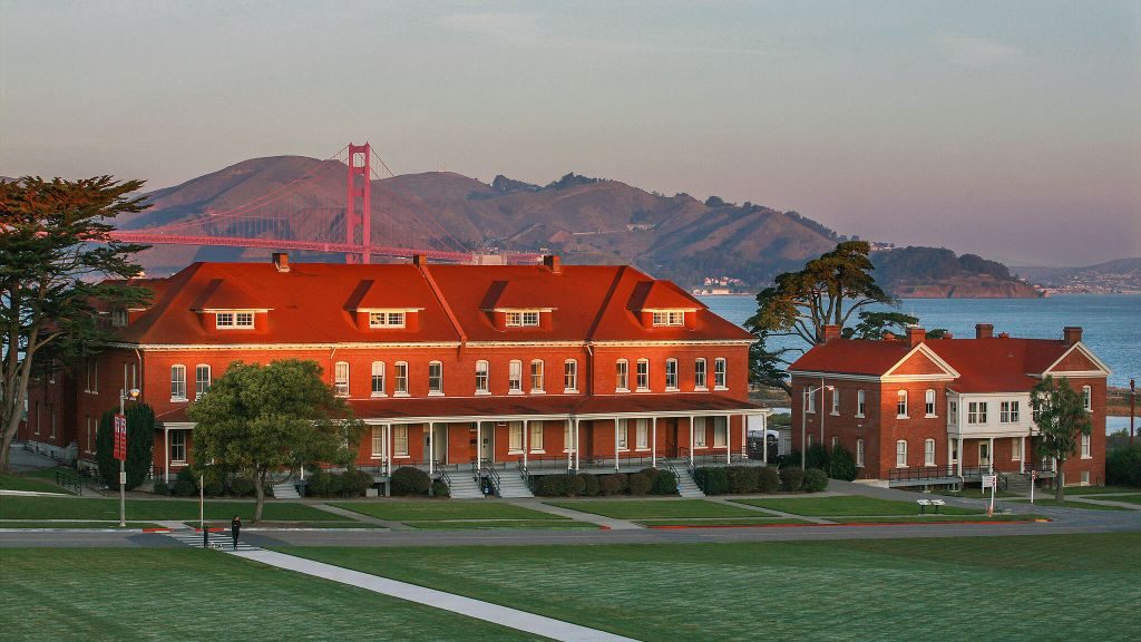 Exterior of The Lodge at the Presidio in front of the Golden Gate Bridge