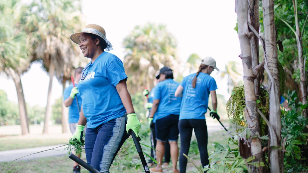 The Breakers Palm Beach staff cleaning up Dreher Park