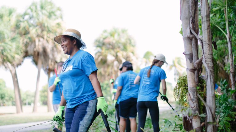 The Breakers Palm Beach staff cleaning up Dreher Park