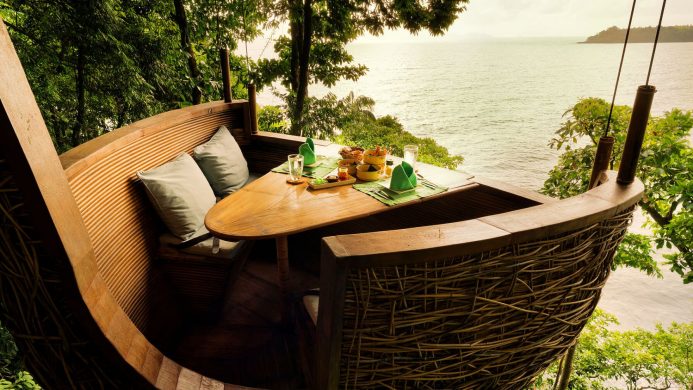 Treepod dining overlooking the sea at Soneva Kiri