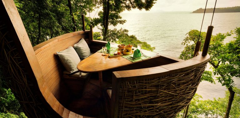 Treepod dining overlooking the sea at Soneva Kiri