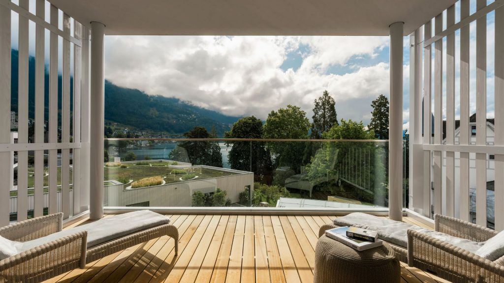 Chenot Palace Weggis hotel suite balcony looking out towards water and mountains