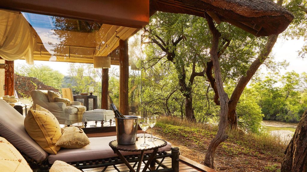 Private deck at Sanctuary Makanyane Safari Lodge overlooking water