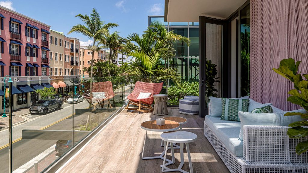 Private terrace at The Ray Hotel overlooking a city street