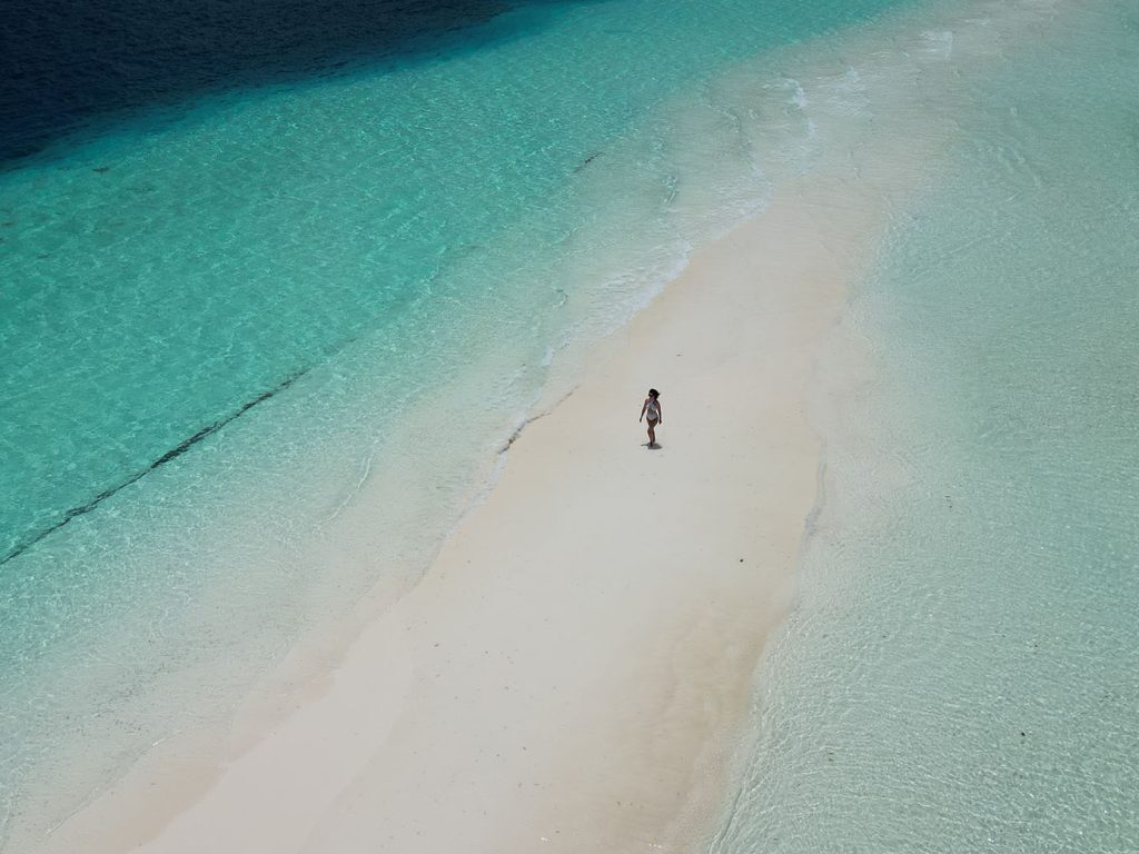COMO Cocoa Island Maldives beach resort on sandbank drone shot by Roxana Cozma of Wanderlust Voyager