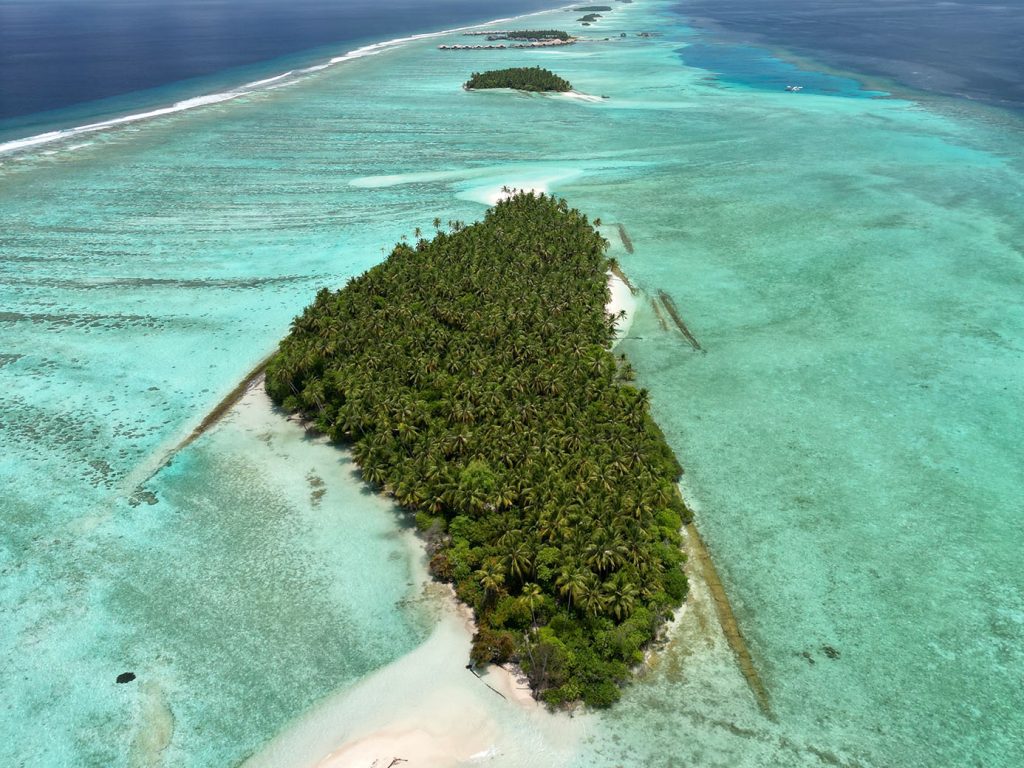 COMO Maalifushi Maldives tropical island resort as seen from above by Roxana Cozma of Wanderlust Voyager