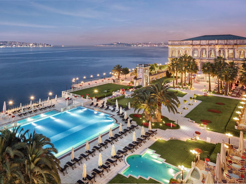 best hotels in Türkiye- Ciragan Palace Kempinski Istanbul exterior garden with pool in front of the Bosphorus