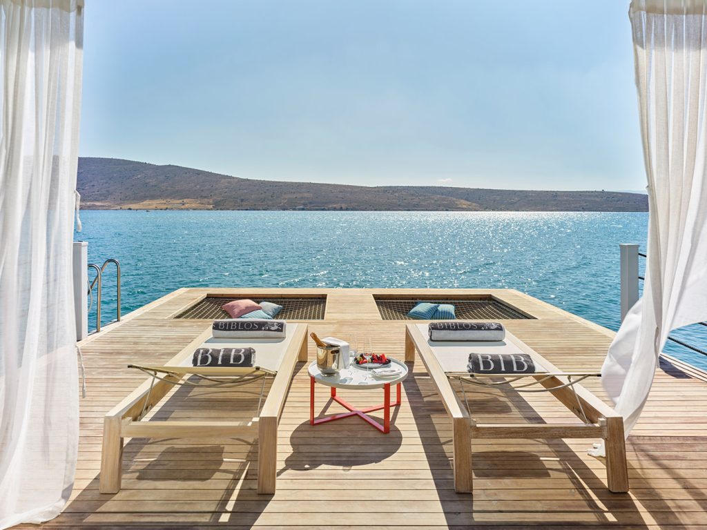 best hotels in Türkiye- Biblos Alacati overwater deck with loungers