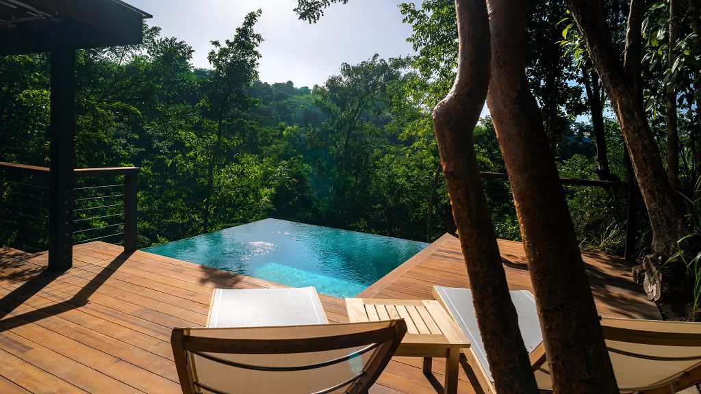 treehouse hotels - Treetops view at Secret Bay's Ti Fey Villa with an outdoor pool deck