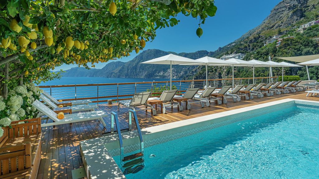 luxury hotel amenities - Gorgeous lemon pergola overlooking the pool with a view of the Amalfi Coast at Casa Angelina.
