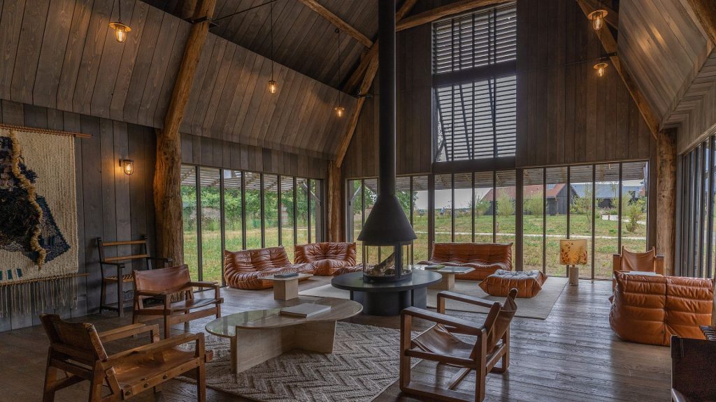 luxury hotel amenities - Cozy lounge area surrounded by Loire Valley vineyards at Les Sources de Cheverny in France.