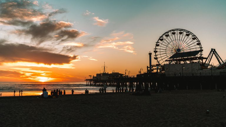 Los Angeles travel guide - Image shows a sunset on the Santa Monica Pier | LA Travel | Destination Guide to Los Angeles