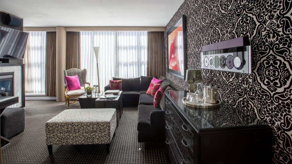 luxury hotel amenities - Chic room with pink accents at OPUS Vancouver, a trendy hotel in Yaletown, Vancouver.