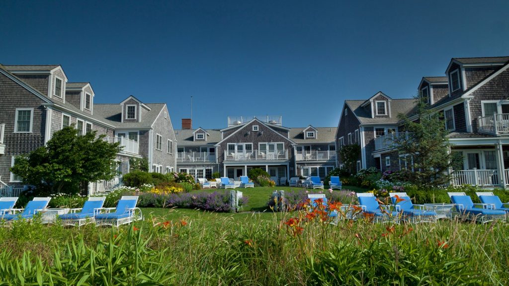 luxury hotel amenities - A stunning image showcasing the White Elephant in Nantucket, a charming coastal retreat with scenic views.