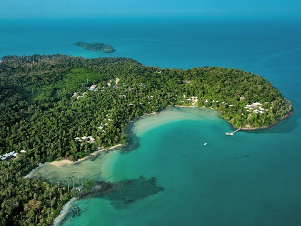 20 unforgettable stays - Soneva Kiri and surrounding ocean aerial view